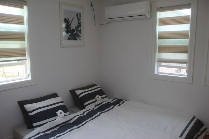 Imagen de la habitación del Hotel All-in-one Guesthouse. Foto 26