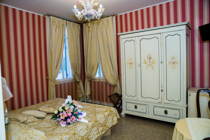 Imagen de la habitación del Hotel Alloggi Acquavita. Foto 5