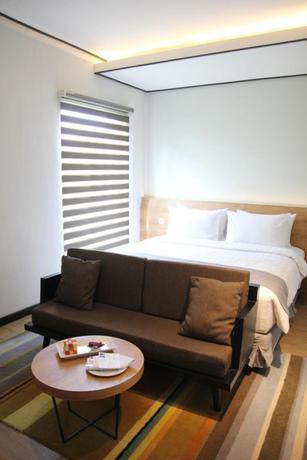 Imagen de la habitación del Hotel Allstay Ecotel Yogyakarta. Foto 6