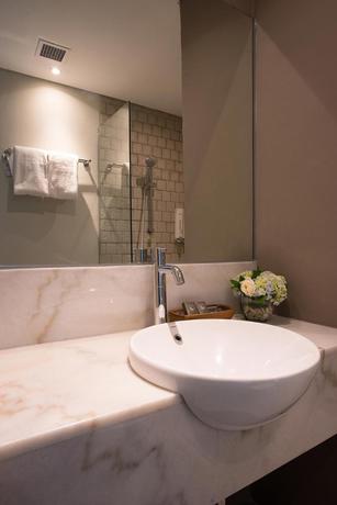 Imagen de la habitación del Hotel Allstay Semarang. Foto 5