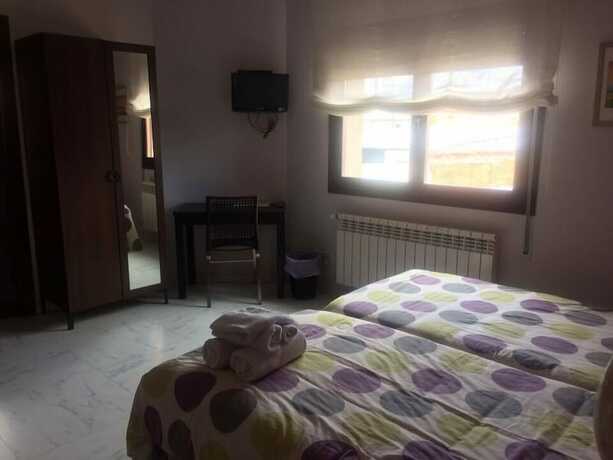 Imagen de la habitación del Hotel Allucant. Foto 20