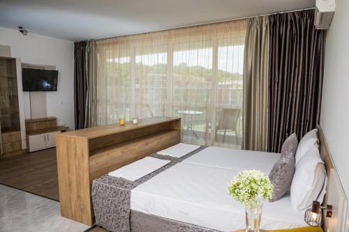 Imagen de la habitación del Hotel Allure Beach Resort Aparthotel. Foto 19