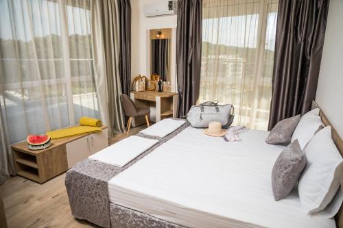 Imagen de la habitación del Hotel Allure Beach Resort Aparthotel. Foto 20