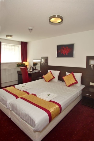 Imagen de la habitación del Hotel Allure. Foto 7