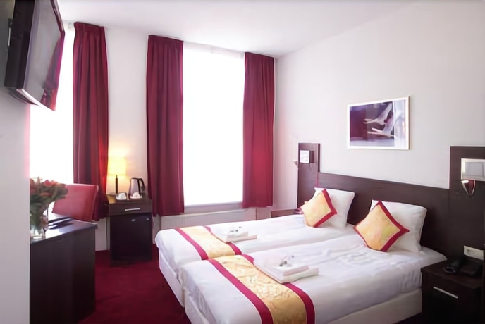 Imagen de la habitación del Hotel Allure. Foto 17