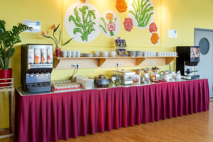 Imagen del bar/restaurante del Hotel Allyouneed Salzburg. Foto 3