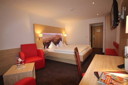 Imagen de la habitación del Hotel Alm- and Wellnesshotel Alpenhof. Foto 7