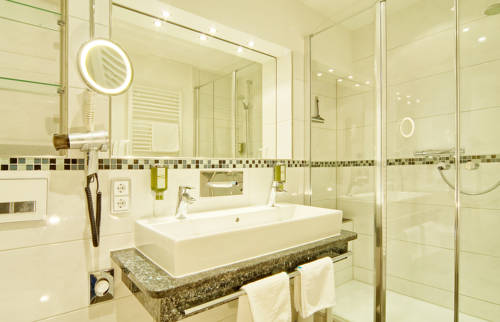 Imagen de la habitación del Hotel Alm- and Wellnesshotel Alpenhof. Foto 13