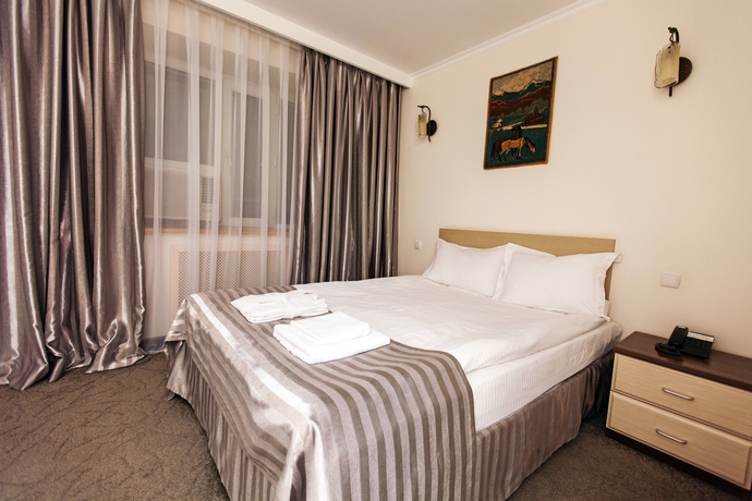 Imagen de la habitación del Hotel Alma, Almaty. Foto 7