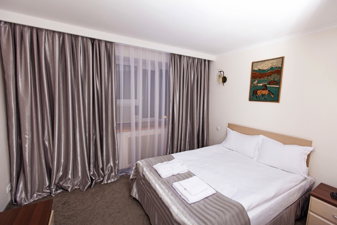 Imagen de la habitación del Hotel Alma, Almaty. Foto 8
