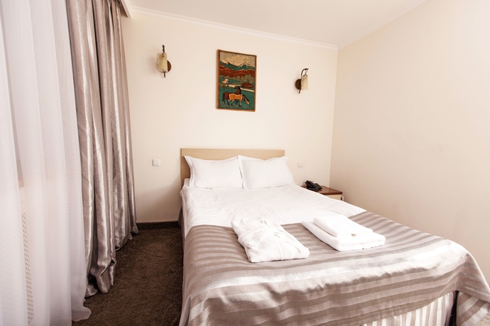 Imagen de la habitación del Hotel Alma, Almaty. Foto 9