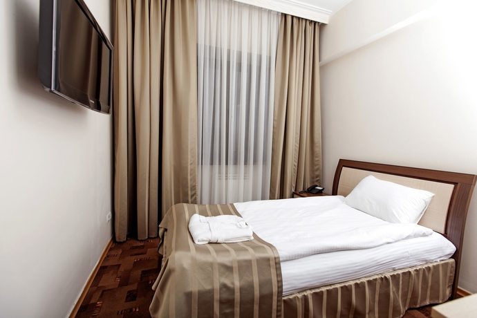 Imagen de la habitación del Hotel Alma, Almaty. Foto 15