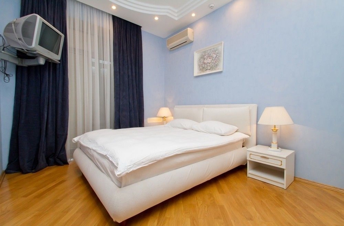Imagen de la habitación del Hotel Alma Apartments. Foto 7