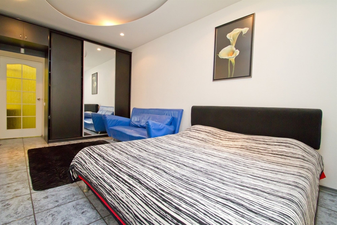 Imagen de la habitación del Hotel Alma Apartments. Foto 15