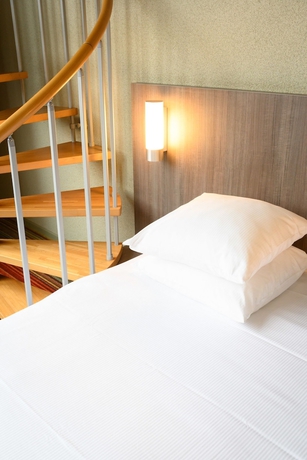 Imagen de la habitación del Hotel Alma Grand Place. Foto 4