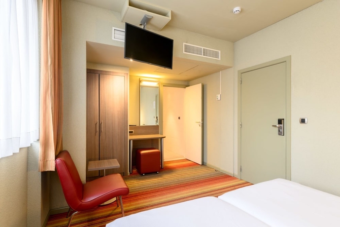 Imagen de la habitación del Hotel Alma Grand Place. Foto 6