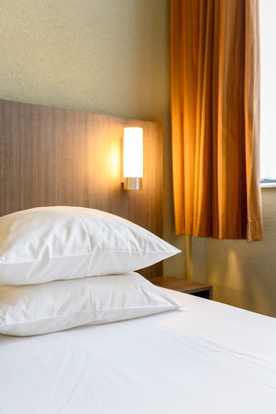 Imagen de la habitación del Hotel Alma Grand Place. Foto 10