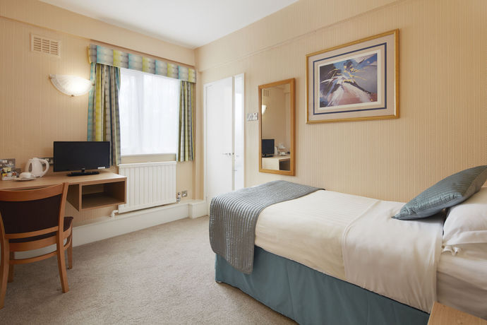 Imagen de la habitación del Hotel Alma Lodge and Restaurant. Foto 7