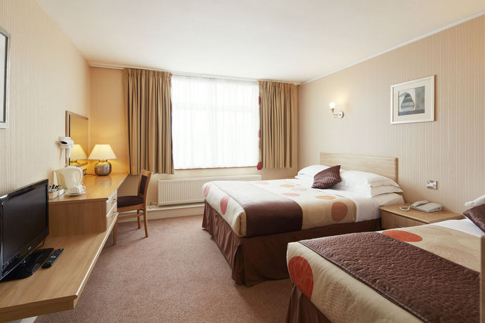 Imagen de la habitación del Hotel Alma Lodge and Restaurant. Foto 10