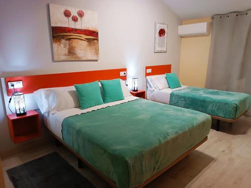 Imagen de la habitación del Hotel Alma Rosa. Foto 13