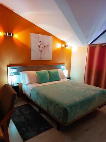 Imagen de la habitación del Hotel Alma Rosa. Foto 19