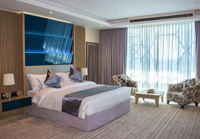 Imagen de la habitación del Hotel Almansour Suites Doha. Foto 11