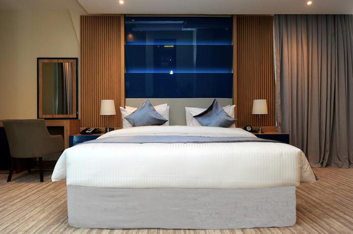 Imagen de la habitación del Hotel Almansour Suites Doha. Foto 12