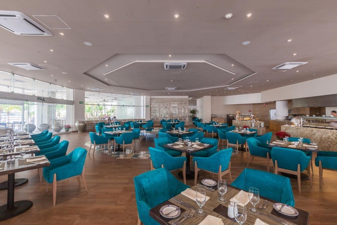 Imagen del bar/restaurante del Hotel Almare, a Luxury Collection Resort, Isla Mujeres, Adult All-Inclusive. Foto 3