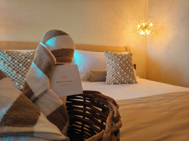 Imagen de la habitación del Hotel Almareia Boutique. Foto 16