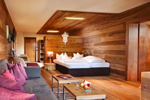 Imagen de la habitación del Hotel Almhof Family Und Wellness Resort. Foto 13