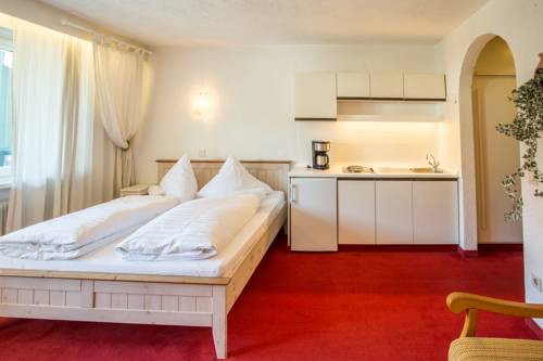 Imagen de la habitación del Hotel Almhof Kitzlodge - Zimmer Suiten Apartments. Foto 7