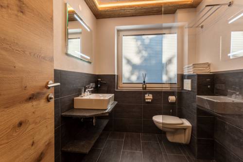 Imagen de la habitación del Hotel Almhof Kitzlodge - Zimmer Suiten Apartments. Foto 8