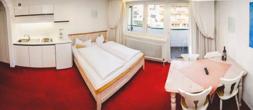 Imagen de la habitación del Hotel Almhof Kitzlodge - Zimmer Suiten Apartments. Foto 10