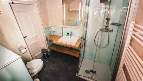 Imagen de la habitación del Hotel Almhof Kitzlodge - Zimmer Suiten Apartments. Foto 13