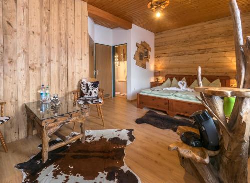 Imagen de la habitación del Hotel Almhotel Gr&uuml;nsteinblick - Adults only. Foto 8