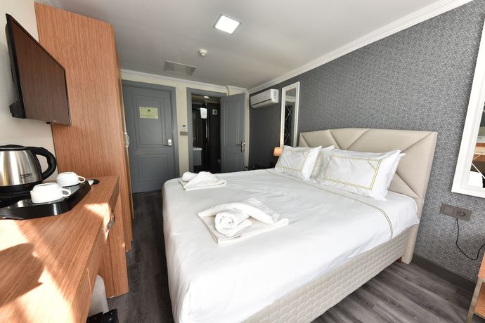 Imagen de la habitación del Hotel Almina Inn. Foto 11