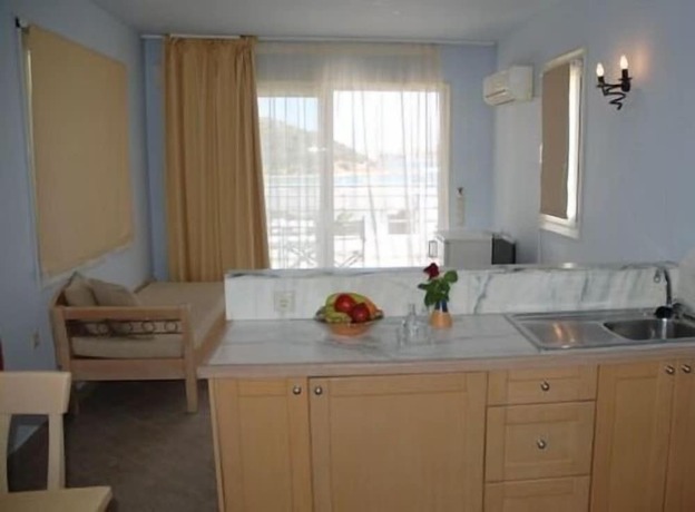 Imagen de la habitación del Hotel Almiros Apartments. Foto 13