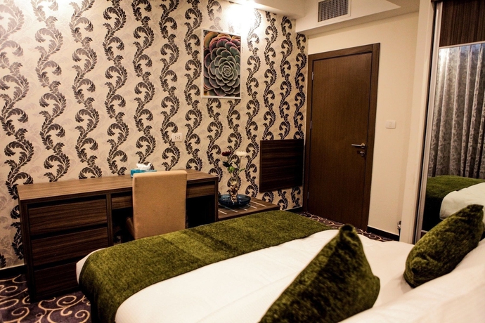 Imagen de la habitación del Hotel Almond Apartments. Foto 11