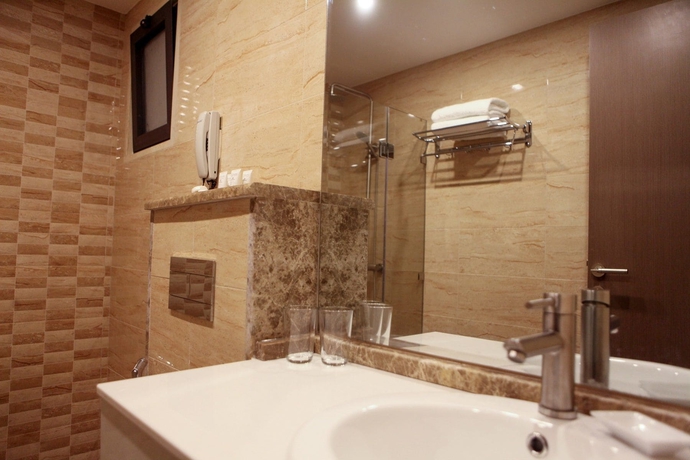 Imagen de la habitación del Hotel Almond Apartments. Foto 15