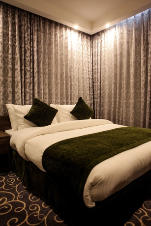 Imagen de la habitación del Hotel Almond Apartments. Foto 16