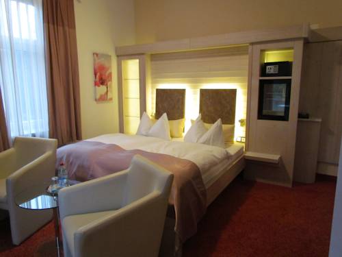 Imagen de la habitación del Hotel Almrausch, Bad Reichenhall. Foto 11