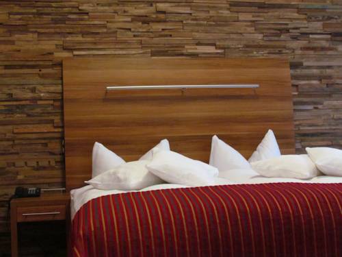 Imagen de la habitación del Hotel Almrausch, Bad Reichenhall. Foto 12