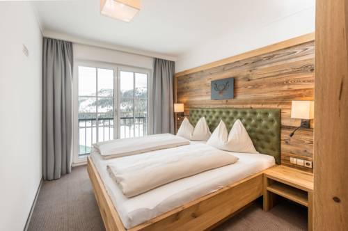 Imagen de la habitación del Hotel Almschlössl & Schrotteralm. Foto 5