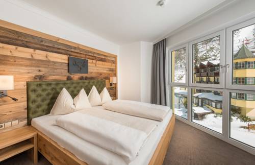 Imagen de la habitación del Hotel Almschlössl & Schrotteralm. Foto 14