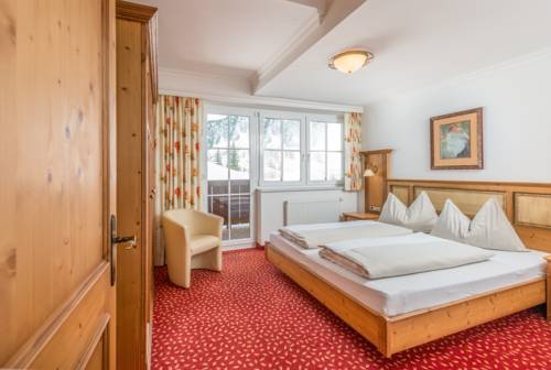 Imagen de la habitación del Hotel Almschlössl & Schrotteralm. Foto 16