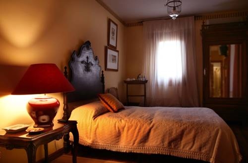 Imagen de la habitación del Hotel Almunia De San Miguel. Foto 13