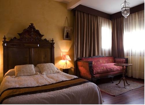 Imagen de la habitación del Hotel Almunia De San Miguel. Foto 15