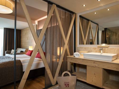 Imagen de la habitación del Hotel Almwellness Pierer. Foto 13