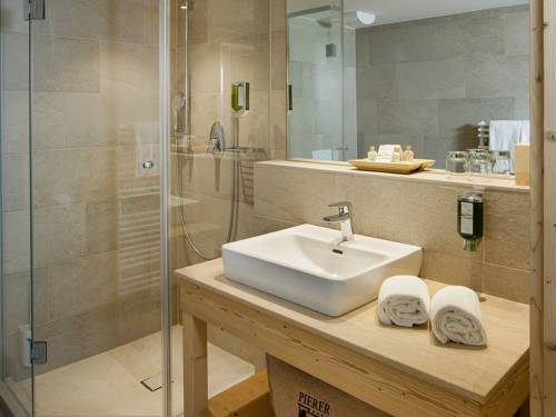 Imagen de la habitación del Hotel Almwellness Pierer. Foto 16