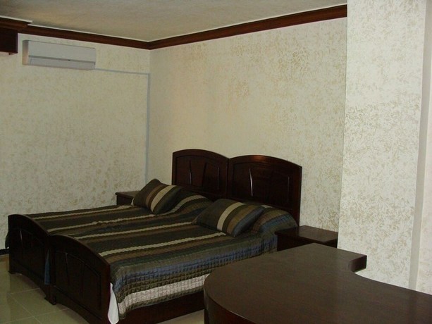 Imagen de la habitación del Hotel Alnahas Plaza. Foto 14